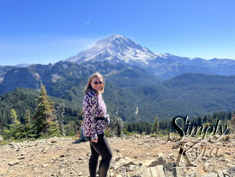 Me in focus in front of a slightly blurred Mount Rainier/Tahoma.