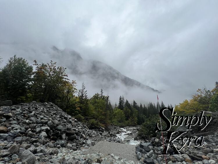 I turned around to snap a photo of where the water goes with the mountain and fog in the background. 