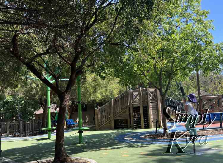 Image shows the kids playing at one of their parks. 