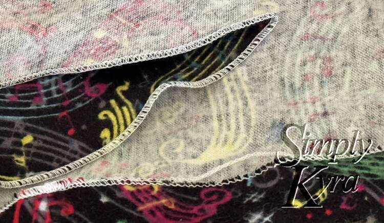 The fully serged edge after one time with excess thread.