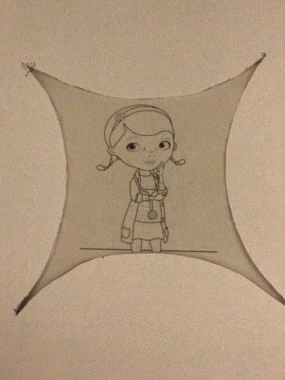 Seeing if the Doc McStuffins printable fits within the template window. She was a bit too large so I drew a line where she was cut off and went on to resize and print her off again.