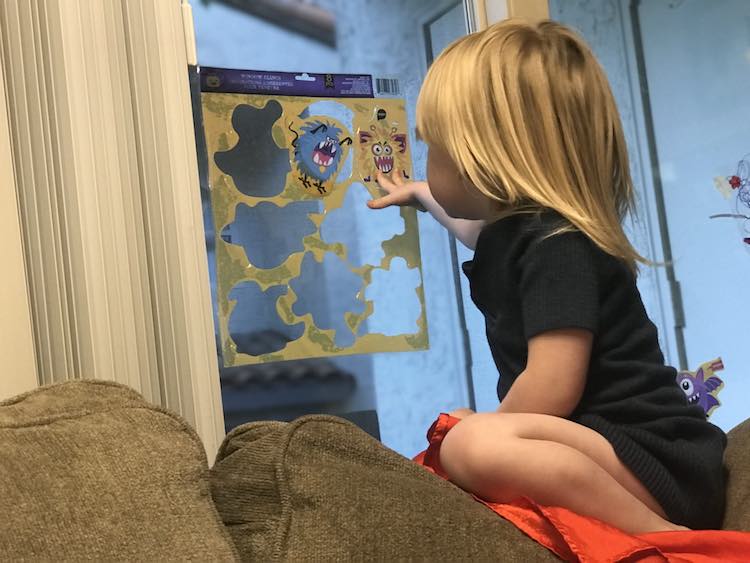 Wanting a picture with her puzzle when she saw me with my phone.
