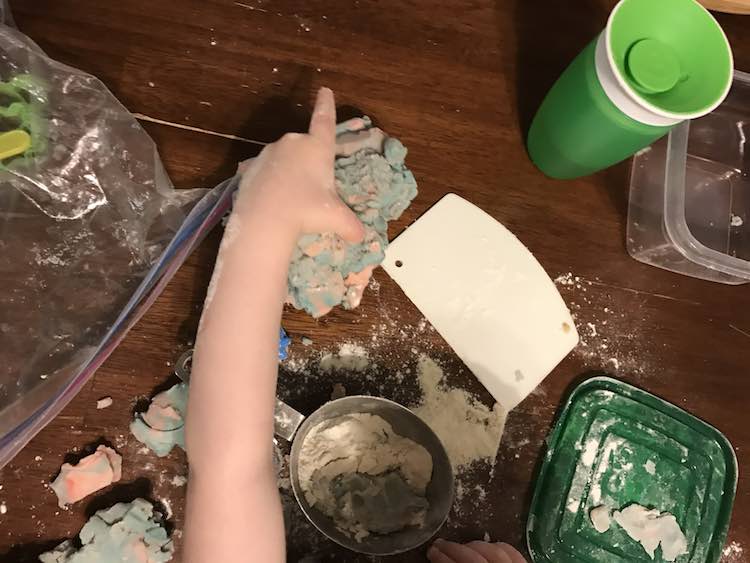 We also baked cookies together. I was able to distract Ada while I rolled them out myself by giving her playdough to make her own cookies. I then extended the play by giving her some flour, a measuring cup, and my leftover baking tools since there was no raw egg in the dough.