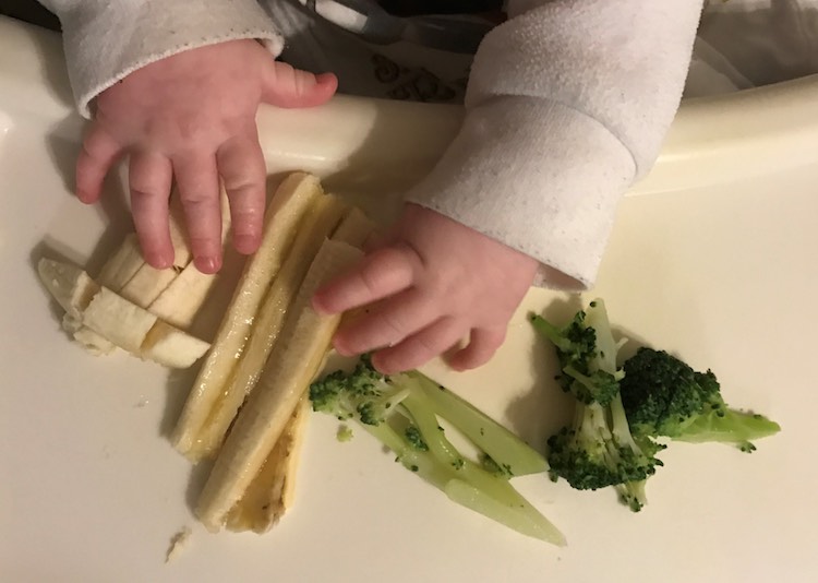 Trying two different sized bananas