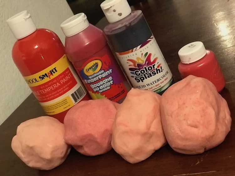 Compare using different paints to dye your playdough.