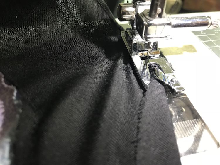 Creating a rolled hem on the bottom of the skirt.