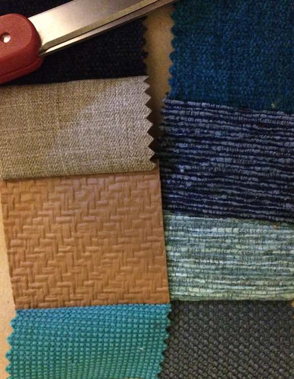 Fabric sample squares sewn into strips.