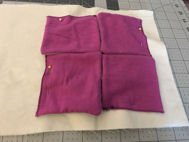 After sewing the flaps and putting them right side out I then pinned them to the page being careful to fully hide the mirror.