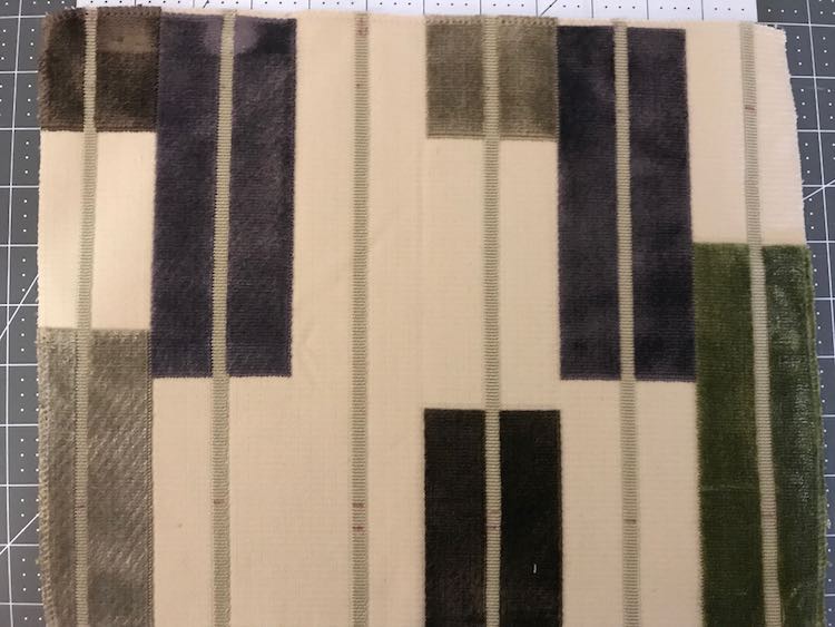 I traced horizontal and vertical lines on the fabric swatch so I would know where to sew to turn the swatch into doors.
