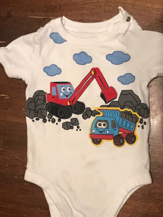 Gerber Walmart onesie with a backhoe and a dump truck on it.