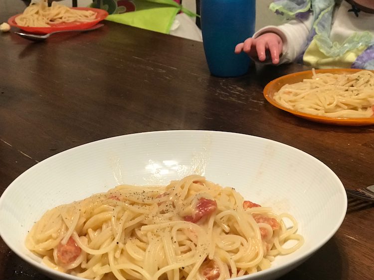 Spaghetti noodles, canned tomatoes, cheese, milk, and pepper.... so good.