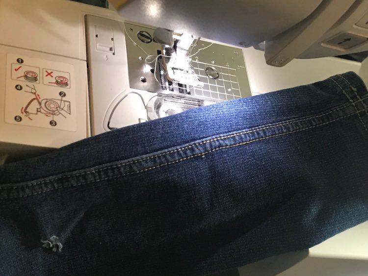 The legs are way too skinny to fit around my sewing machine so the only other option seemed to be to open up the seam to access the hole.