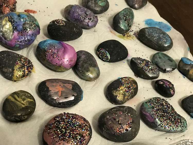 You could include glitter and dip the wet rocks into it or use your paintbrush to mix it with the paint.