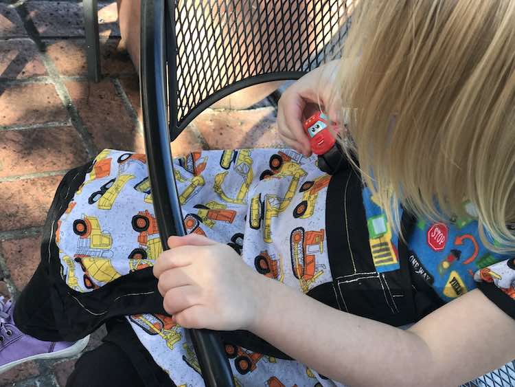 Today at lunch I highlighted the benefits of the dress while Zoey continued to eat. The car made it's way back to the table but I love how it's an extra play surface.