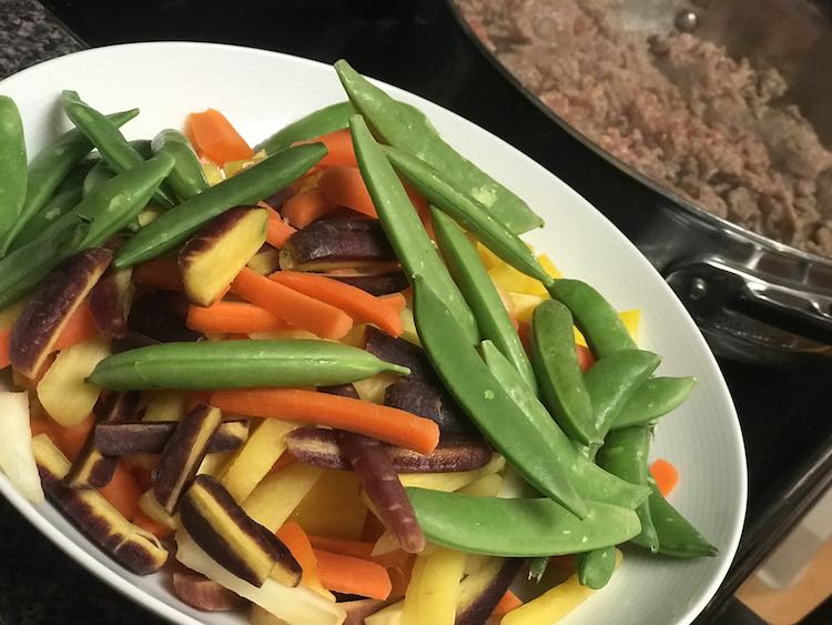 Go through your veggie platter for anything you can throw in. Slice the larger stuff smaller so it's all similar in cook time.