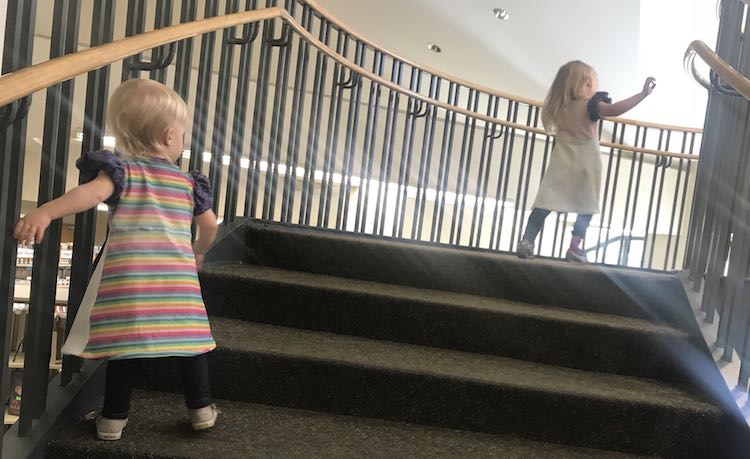Running up the stairs.
