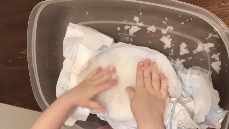 After adding a lot of water we cut open the diaper.
