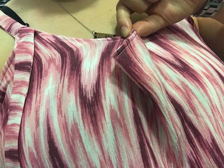 I pinched the excess fabric in the front and used a sewing clip to fasten it before taking the camisole back off.