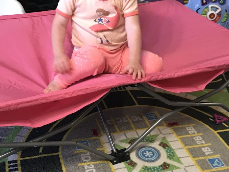 I came out from sewing the fitted sheet to Zoey testing out the cot.