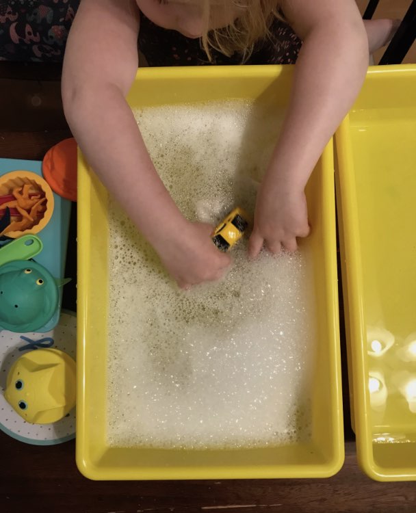 Then a bin of soapy water.