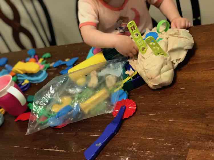 During the playdough making Zoey was playing with our older playdough.