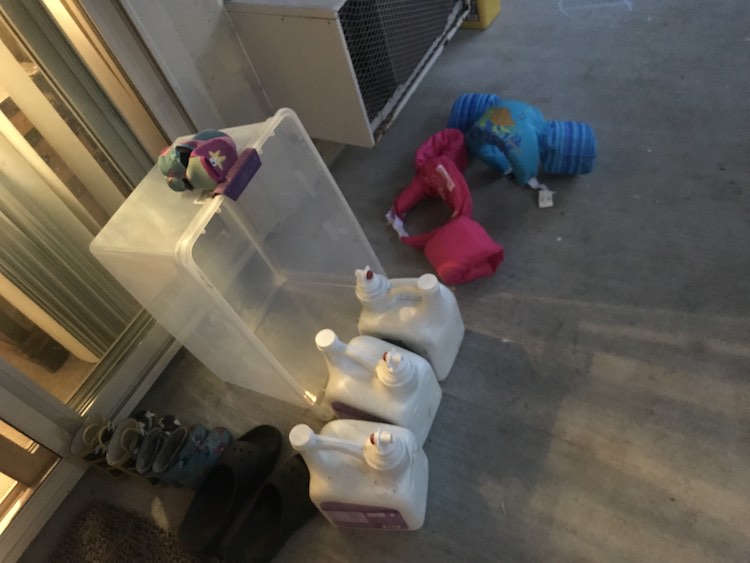 I then set the water bin by the door for easy filling the morning of the party. I also had some cleaned and emptied laundry detergent bottles that the kids could use to pour more water out if they wanted.