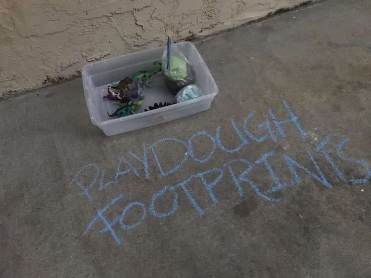 Set up the sensory bin the night before the party by adding a sign with chalk and laying it all in the sensory bin and adding a lid. I made sure to keep the playdough sealed so it didn't dry out.