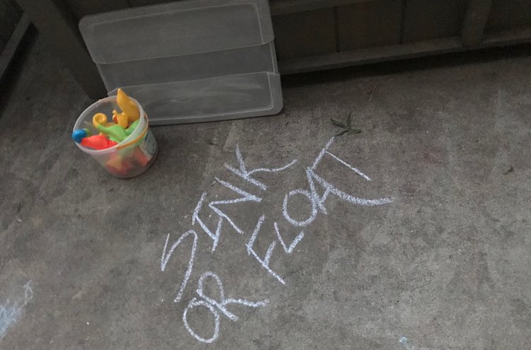 The day before the party I got all the sink or float toys together and drew a title for where the sensory bin was going to go later.