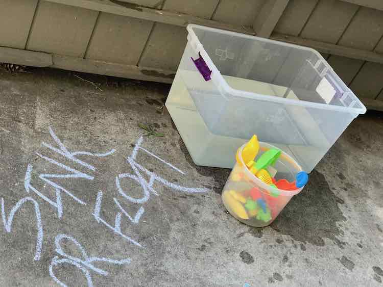 And the filled bin was placed with the toys. Just a heads up maybe move it with the lid on so it doesn't slosh over your living room on the way out the door. A garden hose would definitely make this easier.