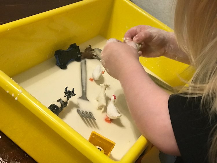 Ada playing with oobleck inside.