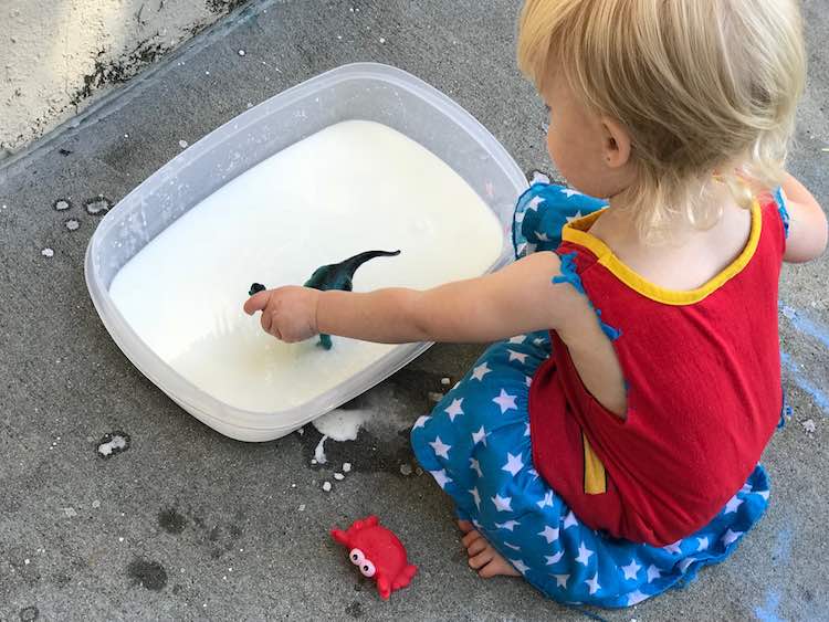 Zoey playing with oobleck.