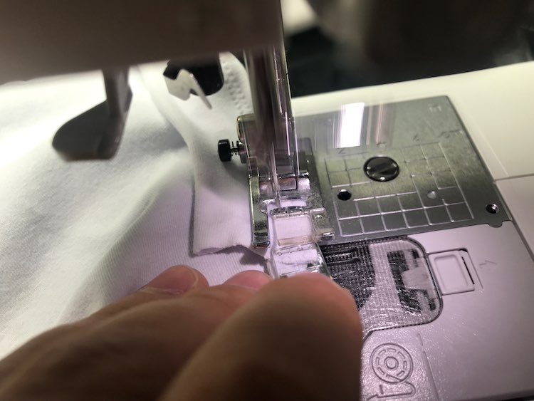 Stop when your sewing machine foot reaches the clip.