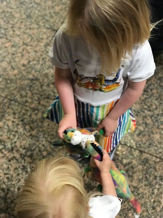 My youngest sister joined us and surprised the girls with adorable apotosauruses that happened to match the dinosaur dresses I surprised them with. Here the dinosaurs are kissing.