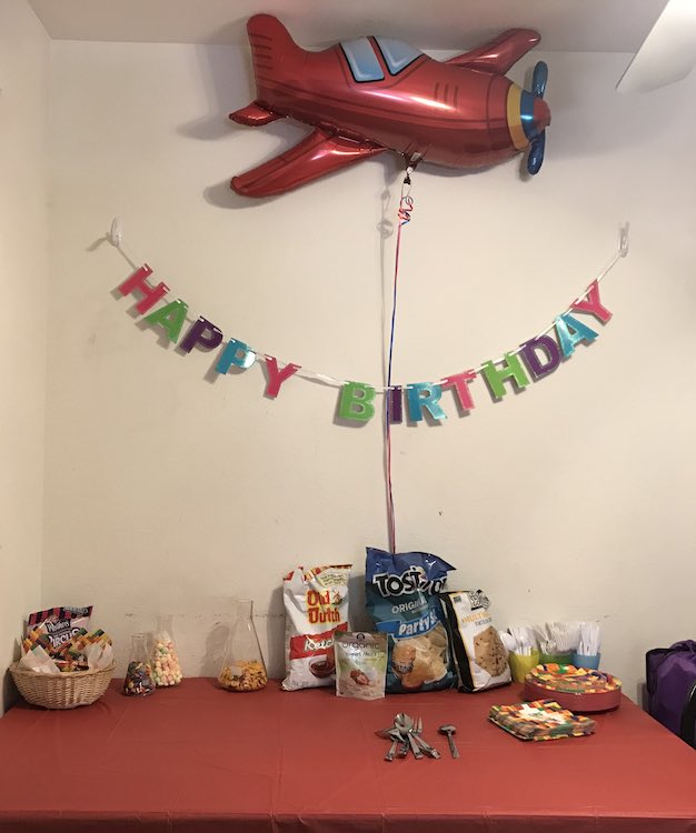 Prepped birthday buffet table.