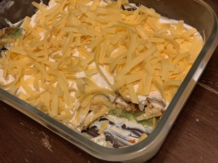 I've since made this in a large container with lid to simplify the storage. I substituted Greek yogurt instead of sour cream with no large difference.