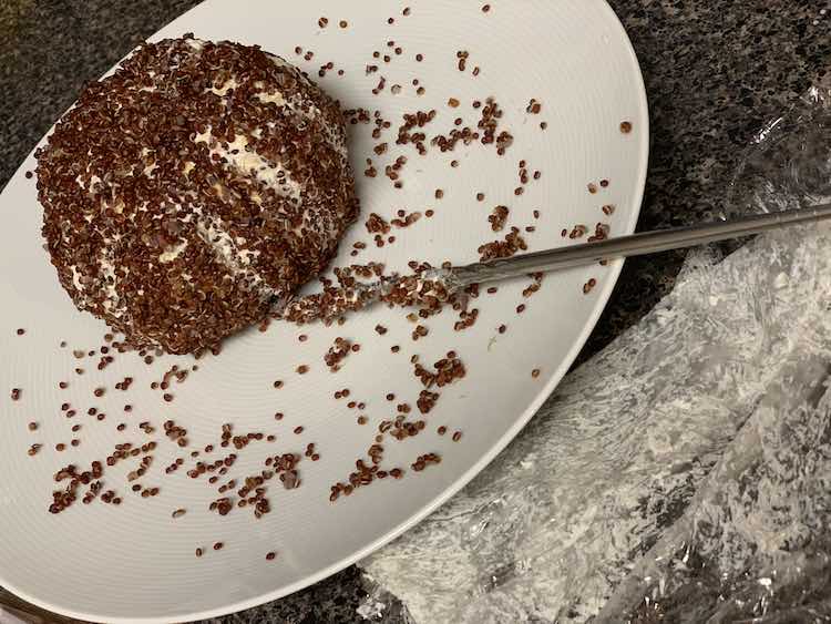 After leaving it in the fridge overnight I took it out the next morning, used a chopstick to mark vertical lines in the ball, rolled it in quinoa laid out on my plate, and then used the chopstick again to attempt to make the lines more distinct.