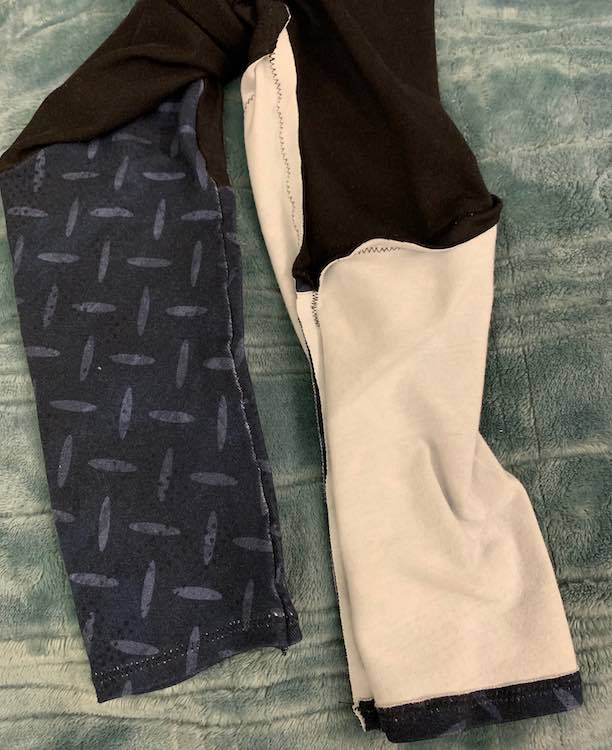 Closeup of the outside (left side) and inside (right) of the pants.