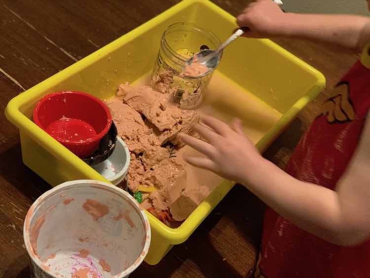 Zoey playing with day old oobleck.