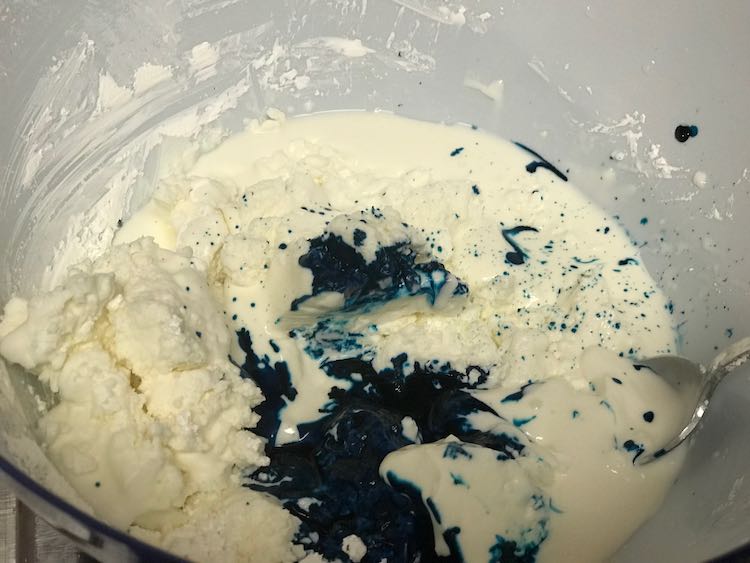 Quickly added some water-based blue food dye to the cornstarch and water before mixing it.