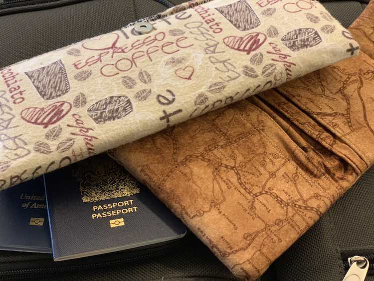 Size comparison with the open family passport and the shortened one.