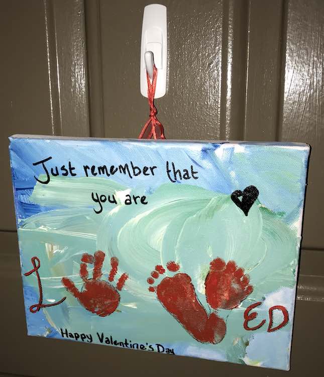 Finished Valentine's Day sign hanging on our door.