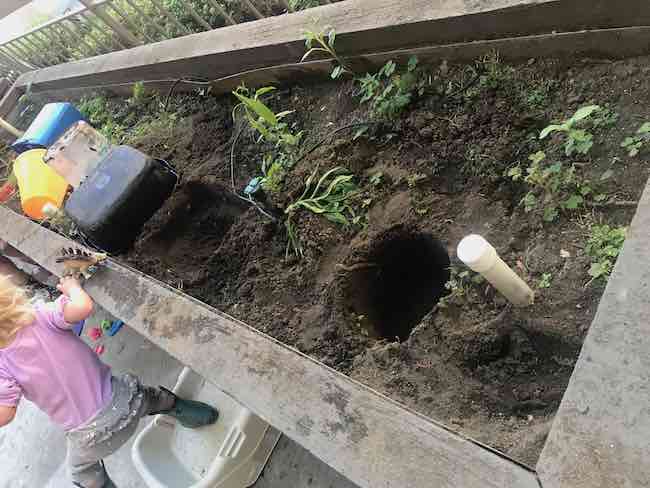 The pools had been removed, dumped, and flipped upside down beside the now empty holes in the garden.