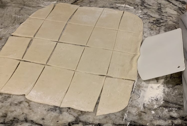 Five by four LEGO® shaped pizza crust.