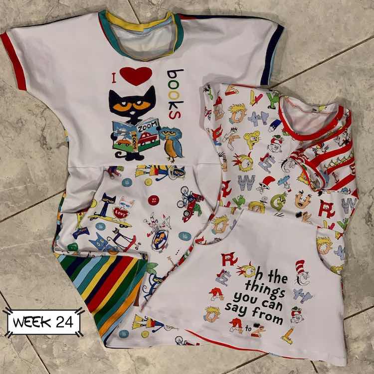 The larger dress on the left and under the smaller has Pete the Cat on it and it says "I heart books". The smaller dress has the panel on the skirt portion rather than the bodice and is Dr Seuss themed with "Oh the things you can say from A to Z"