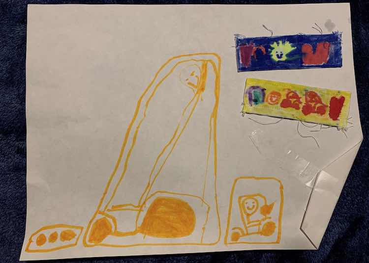 The back of Ada's plackets along with the picture she drew for me showing both a large and small vehicle. 