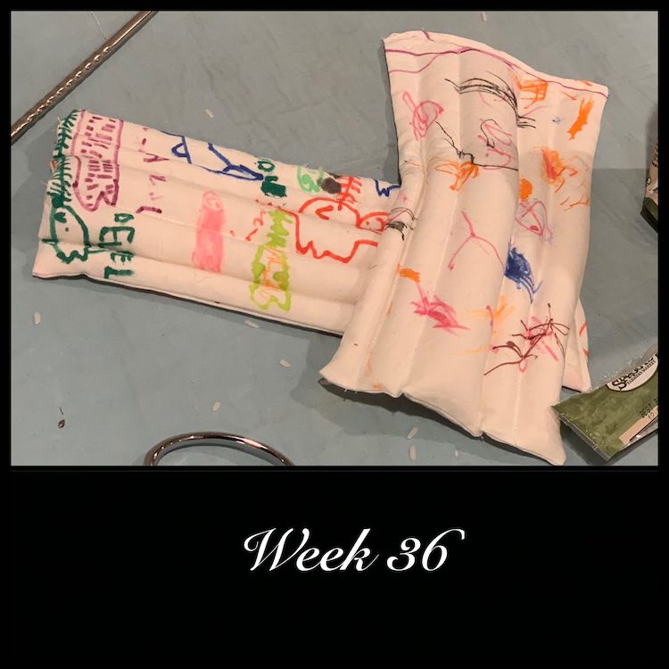 The heat pack on top was designed by Zoey (small scribbles in many colors) while the heat pack underneath was designed by Ada with lots of different drawings on it.