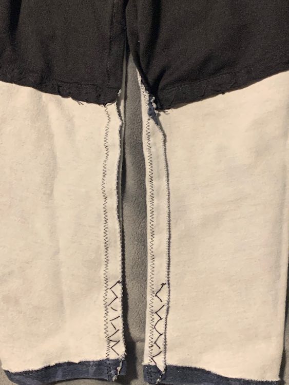 Closeup of the inside of the pants showing the hand stretch stitches.