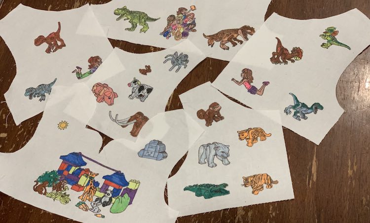 Overview of all six pattern pieces for the two dresses. The bottom three are the DUPLO®-esque pieces showing the animals while the upper three piecea are Ada's LEGO® dinosaurs and Friends.