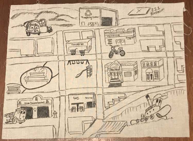 Ada's quiet book page after adding all the details needed in the black fabric marker. Shows a simplified road system with the Stinky and Dirty characters (Stinky, Dirty, Brave, Mighty, and Jumpy) along with buildings and other features. 