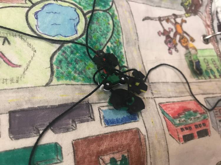 All the buttons are clustered together in one pile with the embroidery floss all tangled up.